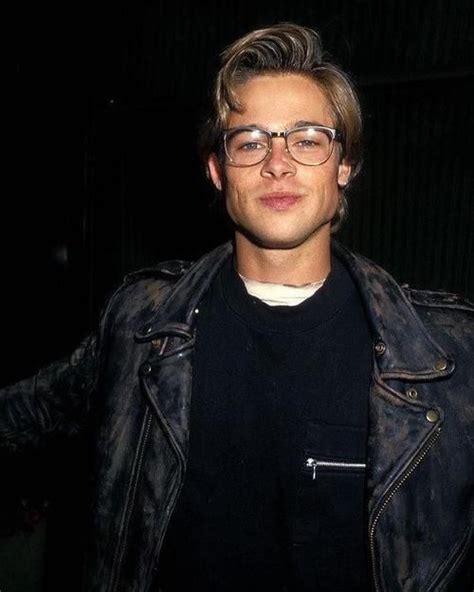 young brad pitt with glasses.